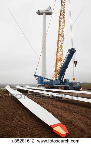 Stock Image - Wind turbine being erected. Fotosearch
