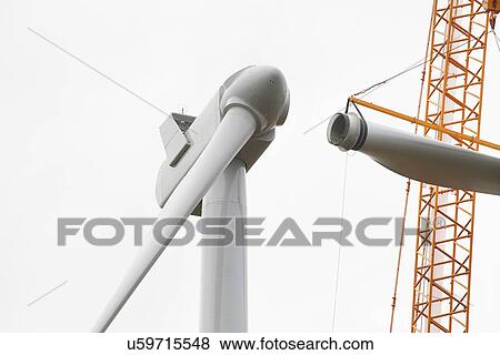 Stock Photo - Wind turbine being erected. Fotosearch