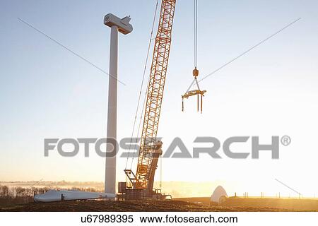 Stock Photography - Wind turbine being erected. Fotosearch