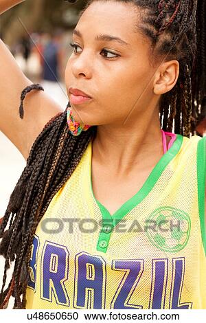 Woman in Brazil t-shirt View Large Photo Image Stock Image - Woman in Brazil t-shirt. Fotosearch