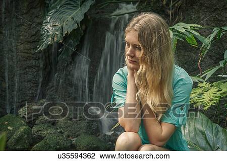 Woman relaxing in forest View Large Photo Image Stock Image - Woman relaxing in forest. Fotosearch