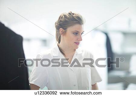 Woman working in laundry View Large Photo Image Stock Image - Woman working in laundry. Fotosearch