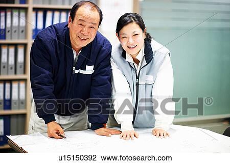 "Workers looking at plans of ship, GoSeong-gun, South Korea" View Large Photo Image Stock Image - "Workers looking at plans of ship, GoSeong-gun, South Korea". Fotosearch