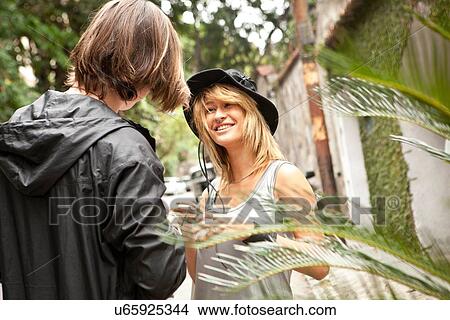 "Young couple on street, Rio De Janeiro, Brazil" View Large Photo Image Picture - "Young couple on street, Rio De Janeiro, Brazil". Fotosearch