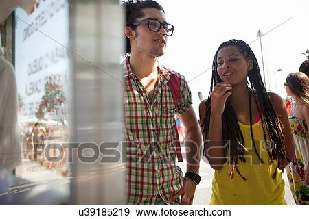 "Young couple reading food stall menu, Copacabana, Rio De Janeiro, Brazil" View Large Photo Image Stock Photo - "Young couple reading food stall menu, Copacabana, Rio De Janeiro, Brazil". Fotosearch