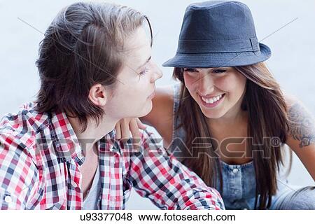 "Young couple smiling, woman wearing hat" View Large Photo Image Stock Photo - "Young couple smiling, woman wearing hat". Fotosearch