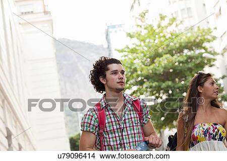 "Young couple strolling on street, Copacabana town, Rio De Janeiro, Brazil" View Large Photo Image Picture - "Young couple strolling on street, Copacabana town, Rio De Janeiro, Brazil". Fotosearch