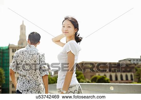 "Young female tourist looking back, The Bund, Shanghai, China" View Large Photo Image Stock Photo - "Young female tourist looking back, The Bund, Shanghai, China". Fotosearch