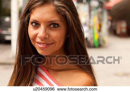Stock Photograph - "Young female tourist on street, Copacabana town, Rio De Janeiro, Brazil". Fotosearch