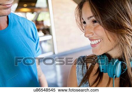 Stock Photography - "Young woman laughing, close up". Fotosearch