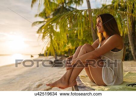 "Young woman looking out from Anda beach, Bohol Province, Philippines" View Large Photo Image Picture - "Young woman looking out from Anda beach, Bohol Province, Philippines". Fotosearch