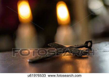 Stock Image - Antique bronze cross. Fotosearch