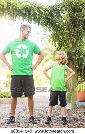 Boy (8-9) face to face with his brother View Large Photo Image Stock Image - Boy (8-9) face to face with his brother. Fotosearch