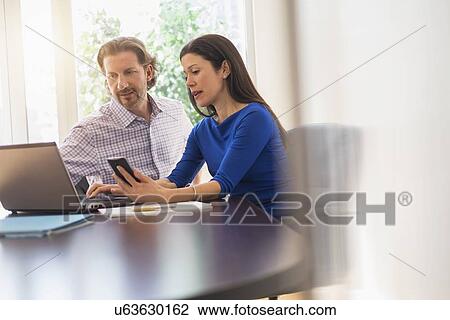 Business people at meeting View Large Photo Image Stock Image - Business people at meeting. Fotosearch