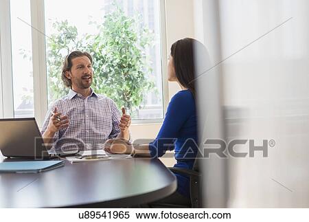 Business people at meeting View Large Photo Image Stock Photography - Business people at meeting. Fotosearch