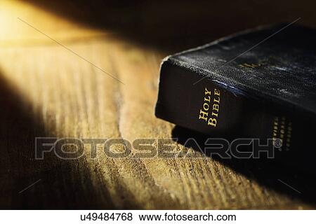 Stock Photo - Close up of Bible on table. Fotosearch