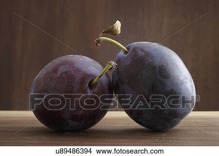 Picture - Close up of italian plums. Fotosearch