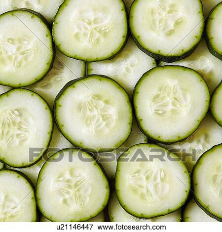 Stock Photo - Close-up view of cucumber slices. Fotosearch