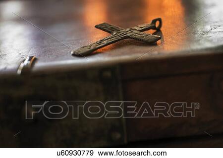 Cross on table View Large Photo Image Stock Photo - Cross on table. Fotosearch