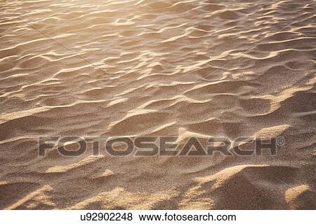 Full frame shot of sand View Large Photo Image Stock Photo - Full frame shot of sand. Fotosearch