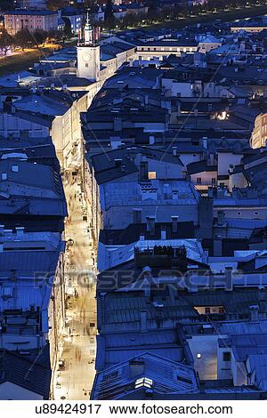 Stock Photo - "Getreidegasse and Salzburg Town Hall, Elevated view of cityscape". Fotosearch