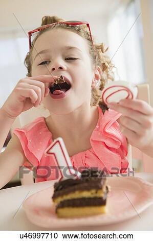 Stock Image - Girl (10-11) celebrating 10th birthday. Fotosearch