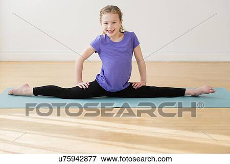 Girl (10-11) doing splits View Large Photo Image Stock Photo - Girl (10-11) doing splits. Fotosearch
