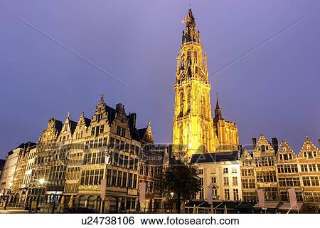 Illuminated Cathedral of Our Lady and townhouses View Large Photo Image Stock Photograph - Illuminated Cathedral of Our Lady and townhouses. Fotosearch