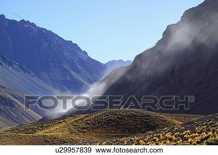 Stock Photo - Landscape with mountain range and valley. Fotosearch