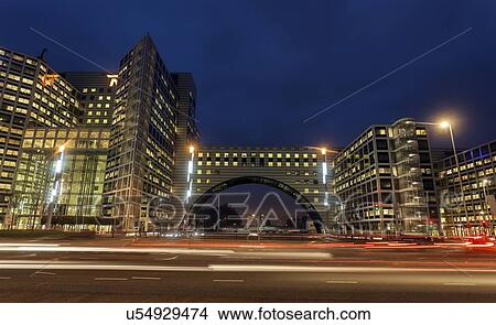 Light trails before illuminated building View Large Photo Image Picture - Light trails before illuminated building. Fotosearch