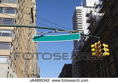 Low angle view of road sign View Large Photo Image Stock Image - Low angle view of road sign. Fotosearch