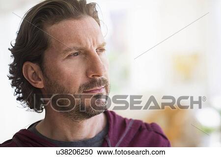 Stock Image - Portrait of handsome mature man. Fotosearch