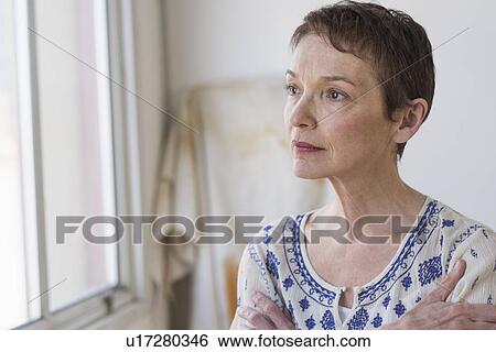 Portrait of senior woman indoors View Large Photo Image Stock Photograph - Portrait of senior woman indoors. Fotosearch