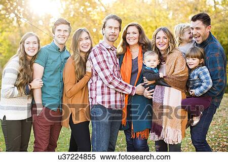 Stock Photography - Portrait of smiling family. Fotosearch