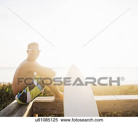 Stock Photography - Portrait of surfer. Fotosearch