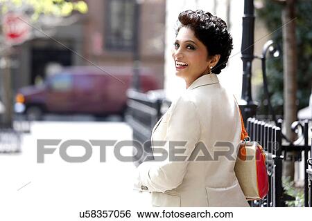 Stock Photograph - Portrait of well-dressed mature woman. Fotosearch