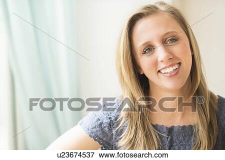 Portrait of woman smiling View Large Photo Image Stock Photo - Portrait of woman smiling. Fotosearch