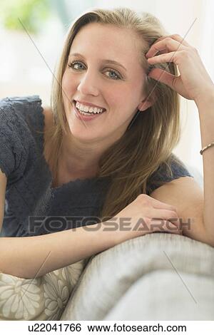 Stock Photograph - Portrait of woman smiling. Fotosearch