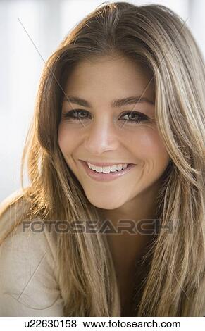 Stock Photo - Portrait of young woman. Fotosearch