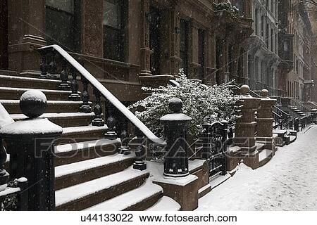 Stock Image - Row houses in winter. Fotosearch