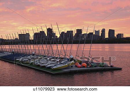 Sailboats on dock Charles River Boston at dawn View Large Photo Image Stock Image - Sailboats on dock Charles River Boston at dawn. Fotosearch