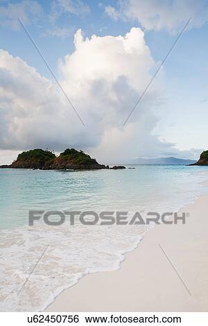 Scenic view of beach by sea View Large Photo Image Stock Photograph - Scenic view of beach by sea. Fotosearch