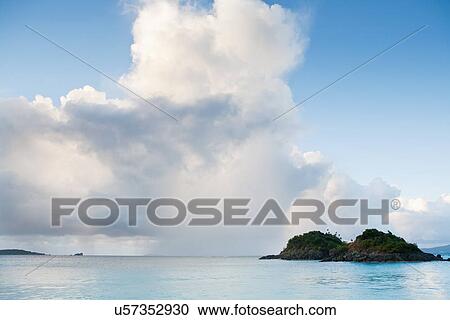 Stock Image - Scenic view of island on sea. Fotosearch