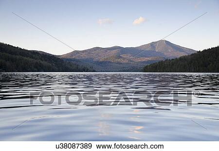 Stock Photo - Scenic view of lake. Fotosearch