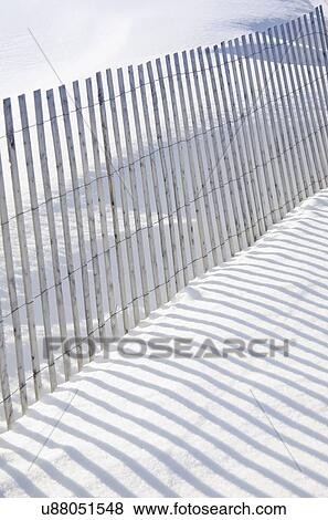 Shadow of fence on snow View Large Photo Image Stock Photo - Shadow of fence on snow. Fotosearch