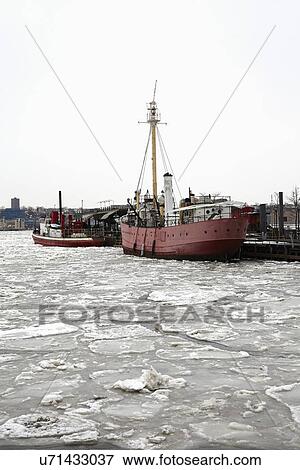 Stock Photo - Ships in commercial dock. Fotosearch