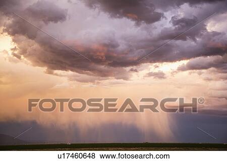 Stock Photo - Sky at sunset. Fotosearch