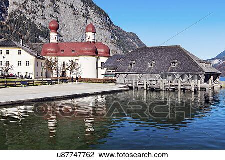 Stock Image - St. Bartholomew's Church by Koenigssee lake. Fotosearch