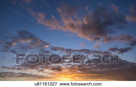 Stock Photo - Sunset sky. Fotosearch