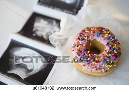 Ultrasound picture and donut View Large Photo Image Stock Image - Ultrasound picture and donut. Fotosearch